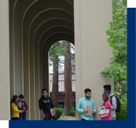 students by large archway