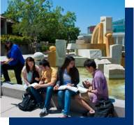 students by large fountain