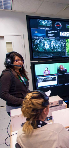 students working in film room