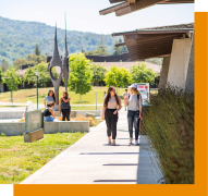 students walking on sidewalk