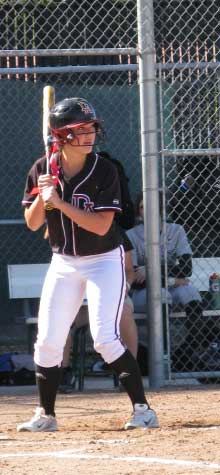 softball player at bat