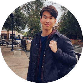 Young man holding backpack