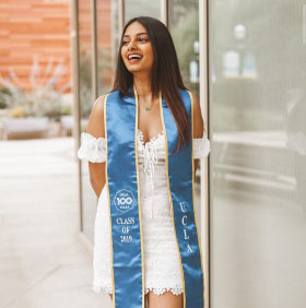 woman with graduate sash